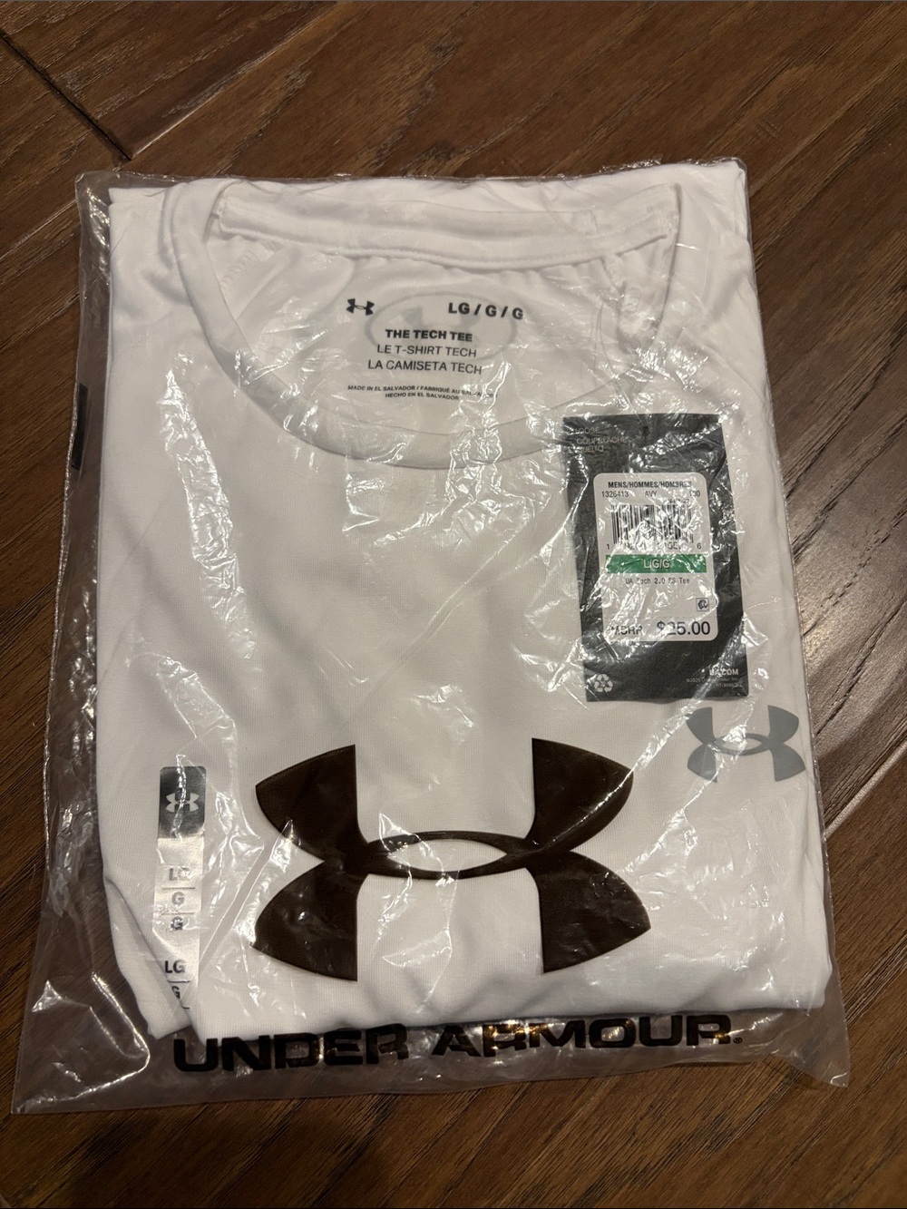 Under Armour Men's White Short Sleeve Performance Tee with gray Logo